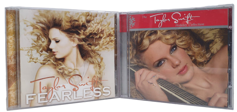 Lot of 2 Taylor Swift CDs, Fearless & Holiday Collection