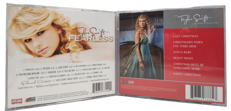 Lot of 2 Taylor Swift CDs, Fearless & Holiday Collection