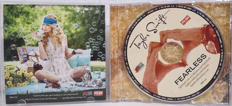 Lot of 2 Taylor Swift CDs, Fearless & Holiday Collection