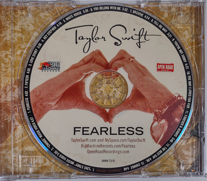 Lot of 2 Taylor Swift CDs, Fearless & Holiday Collection