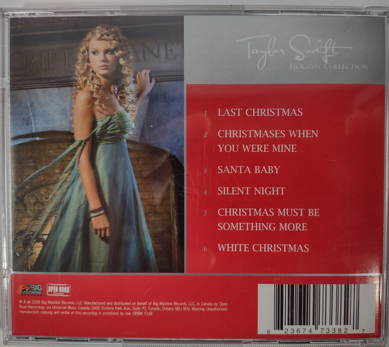 Lot of 2 Taylor Swift CDs, Fearless & Holiday Collection