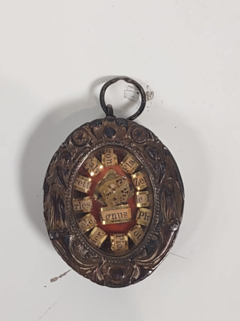 Médaillon reliquaire antique du XIXe siècle en argent