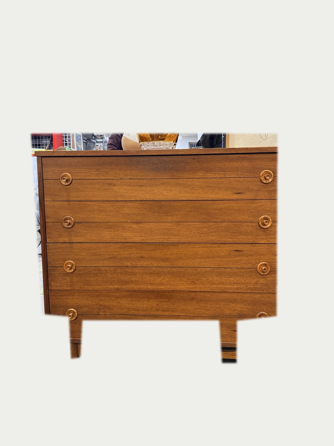Vintage four-drawer dresser on neutral background, view 1