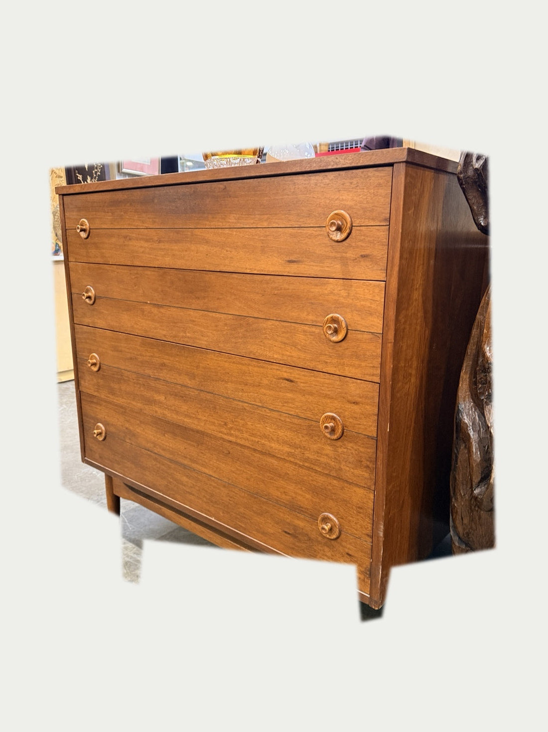 Vintage four-drawer dresser on neutral background, view 2