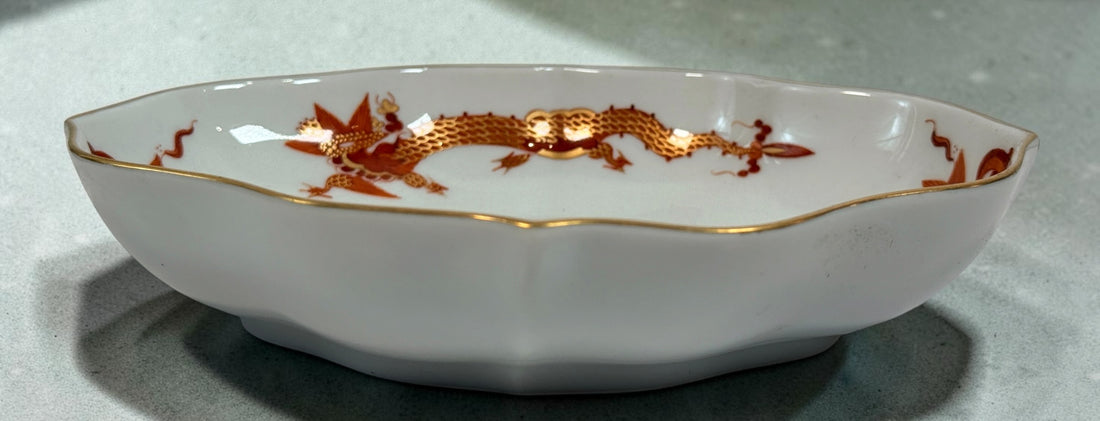 Vintage Meissen Red Dragon oval porcelain dish with gold trim and scalloped edges. Measures 6 × 4.5 inches. Collectible German porcelain.