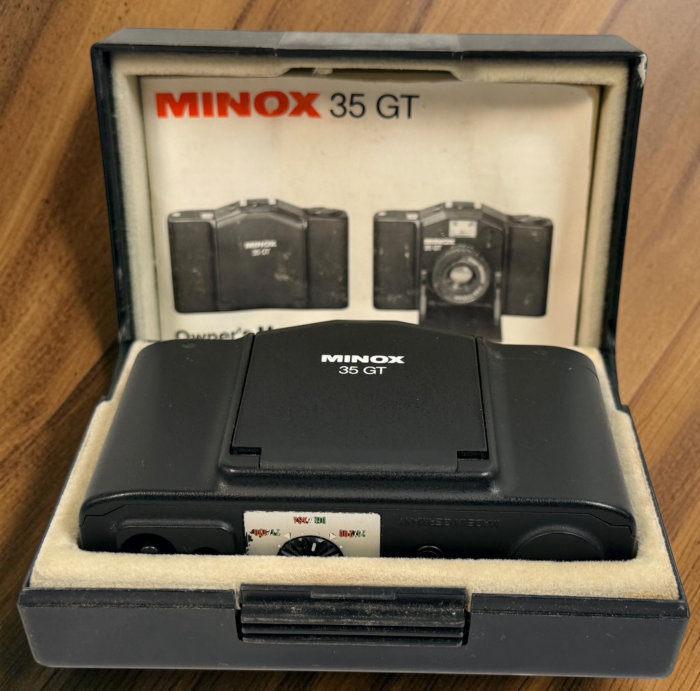 SEO Meta Description: Vintage Minox 35 GT 35mm film camera with Color-Minotar f/2.8 lens, original case and manual. Made in West Germany. Untested vintage collectible.