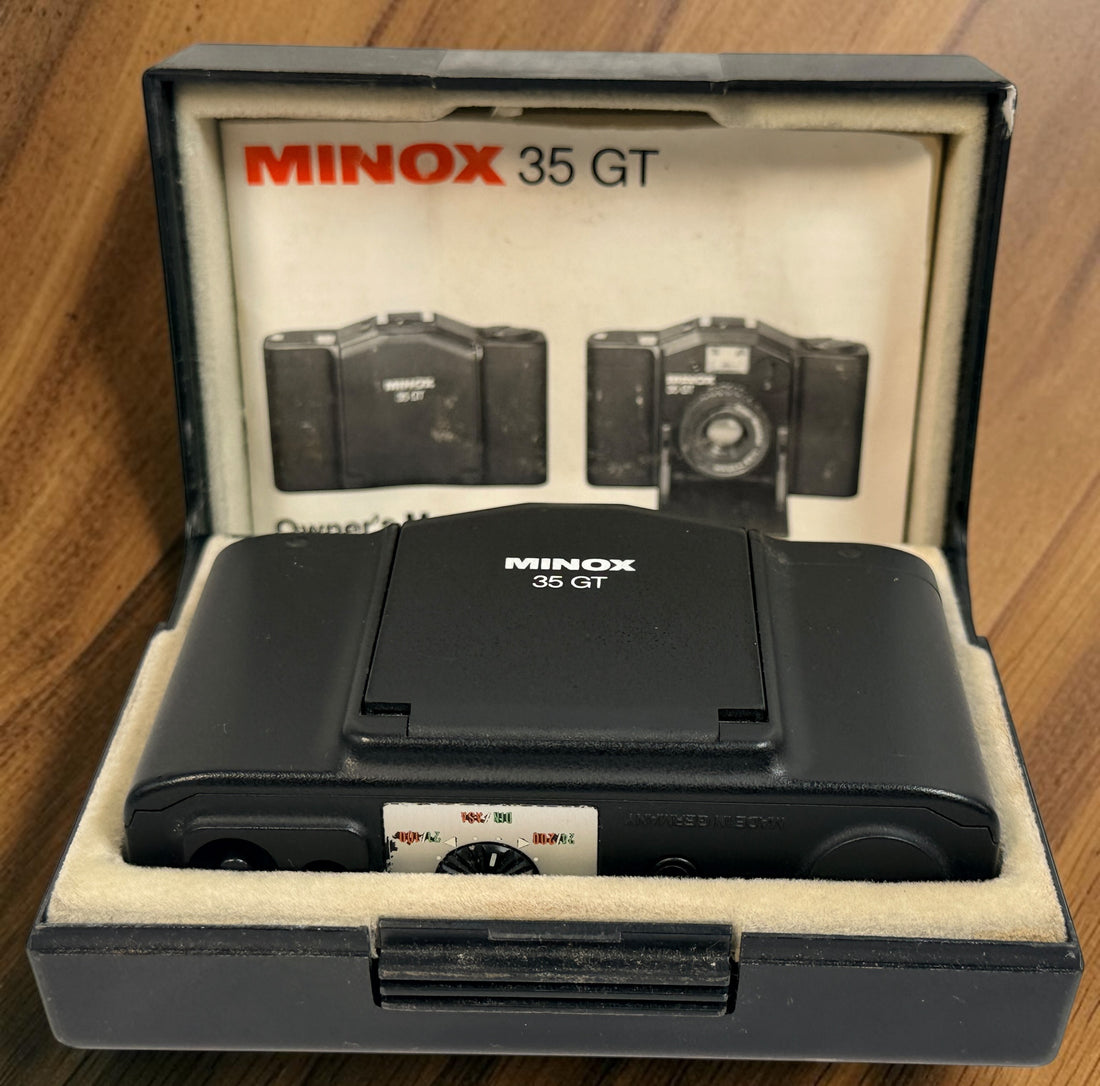 SEO Meta Description: Vintage Minox 35 GT 35mm film camera with Color-Minotar f/2.8 lens, original case and manual. Made in West Germany. Untested vintage collectible.