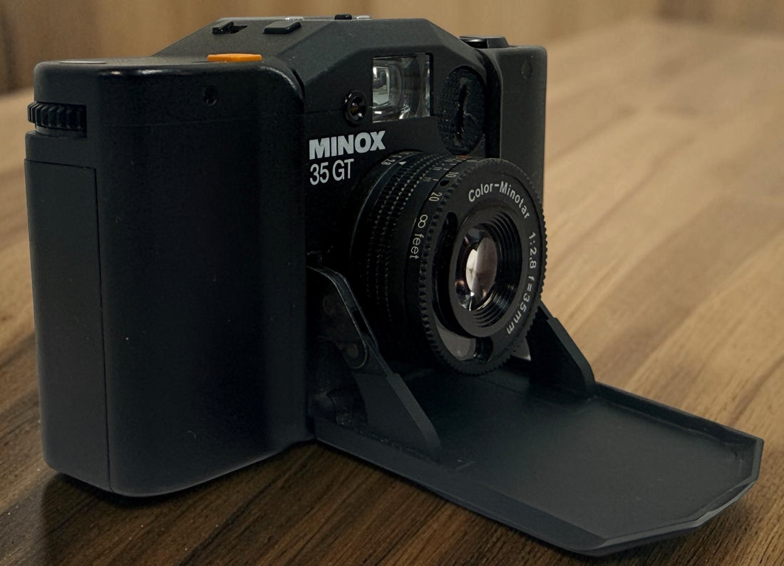 SEO Meta Description: Vintage Minox 35 GT 35mm film camera with Color-Minotar f/2.8 lens, original case and manual. Made in West Germany. Untested vintage collectible.