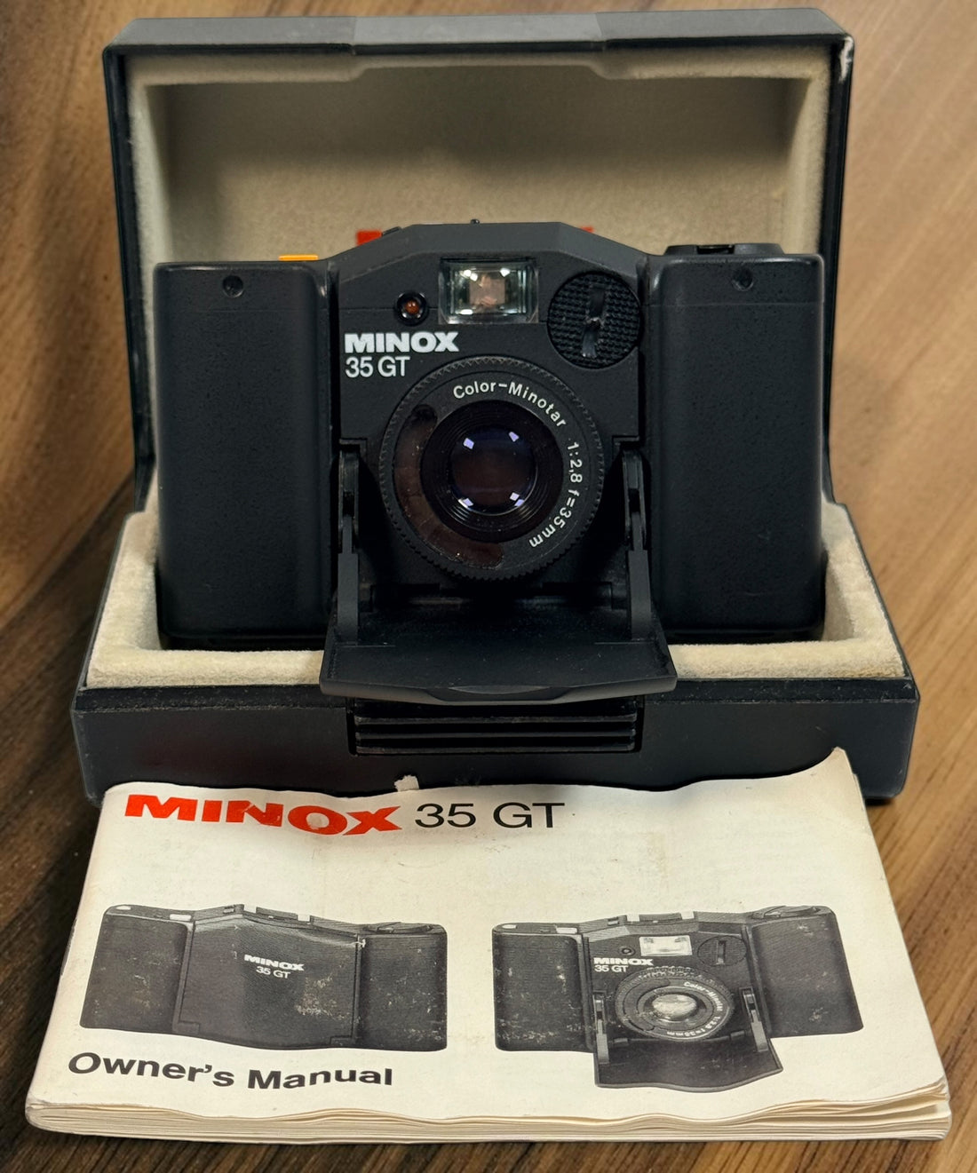SEO Meta Description: Vintage Minox 35 GT 35mm film camera with Color-Minotar f/2.8 lens, original case and manual. Made in West Germany. Untested vintage collectible.