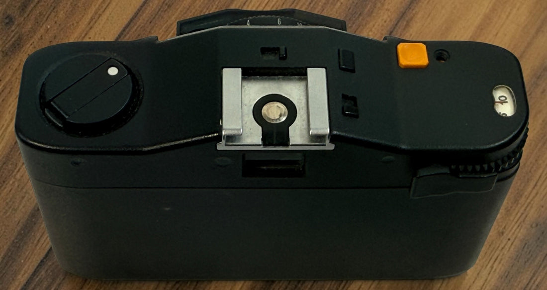 SEO Meta Description: Vintage Minox 35 GT 35mm film camera with Color-Minotar f/2.8 lens, original case and manual. Made in West Germany. Untested vintage collectible.