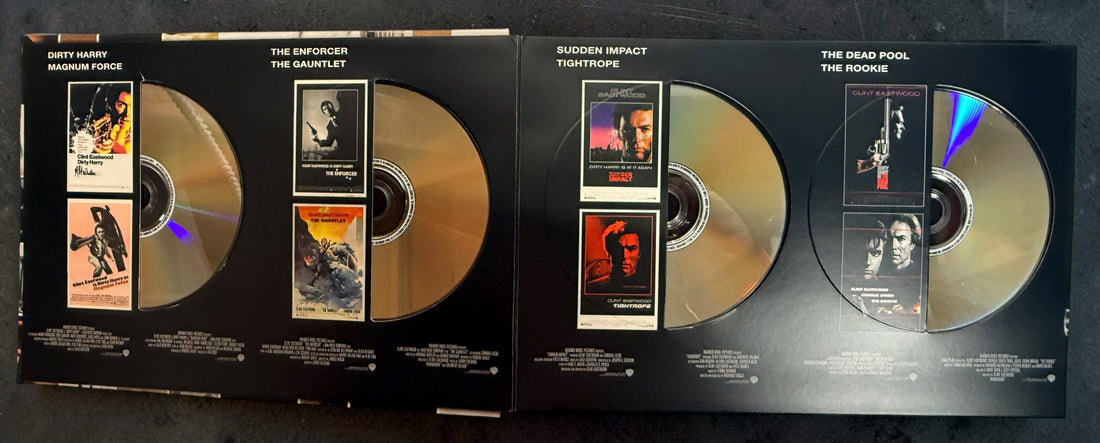 Clint Eastwood 40-Film Collection on 24 DVDs with illustrated collector's case and hardcover companion book. Pre-owned Warner Bros. movie box set.