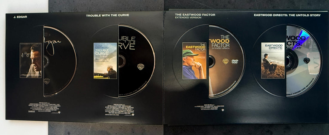 Clint Eastwood 40-Film Collection on 24 DVDs with illustrated collector's case and hardcover companion book. Pre-owned Warner Bros. movie box set.