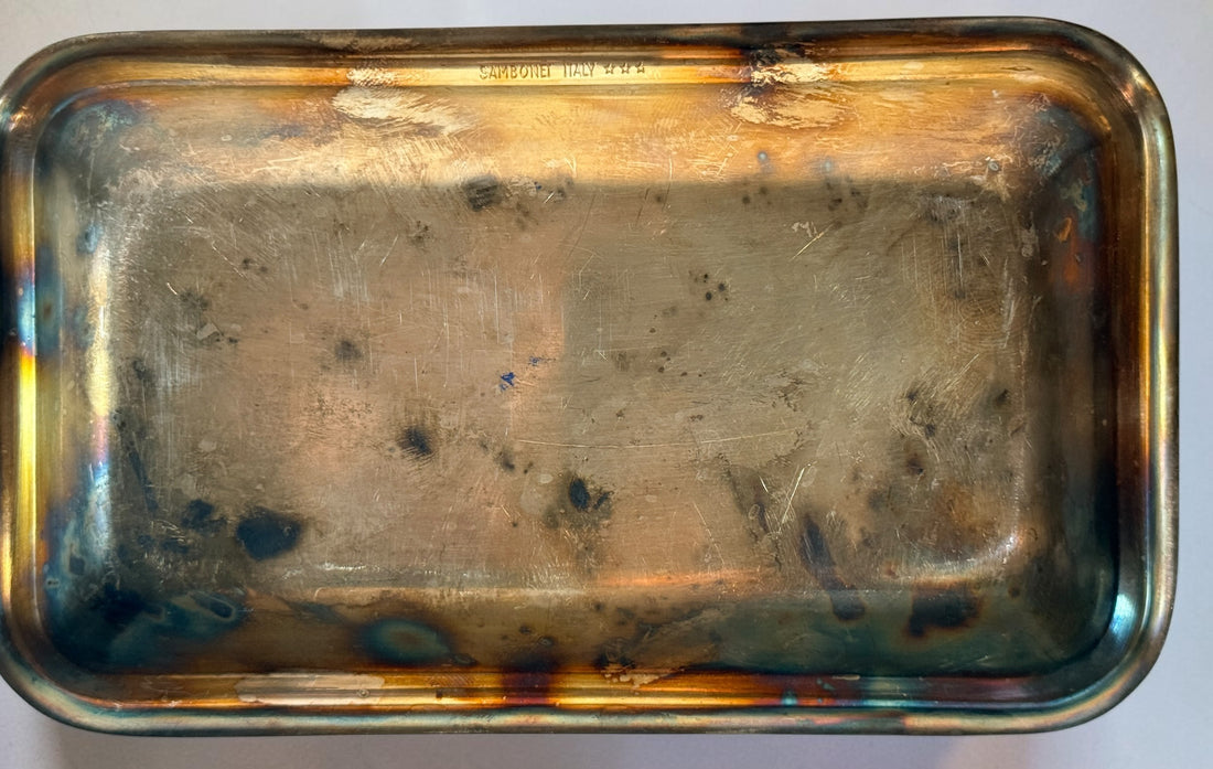  Set of three vintage Sambonet silver-plated trays made in Italy. Rectangular trays with decorative emblems and visible vintage wear.