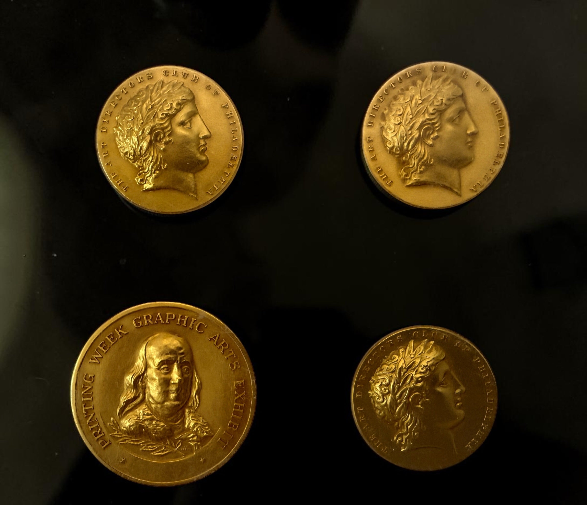 Explore eight vintage graphic arts awards associated with Frank Zachary, including a 1962 Philadelphia Printing Week medallion