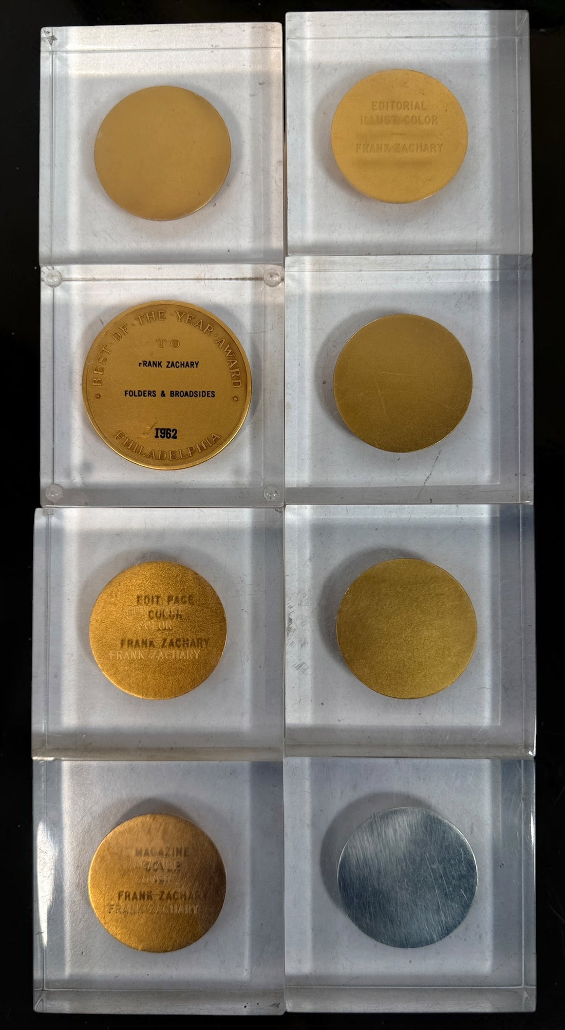 Explore eight vintage graphic arts awards associated with Frank Zachary, including a 1962 Philadelphia Printing Week medallion
