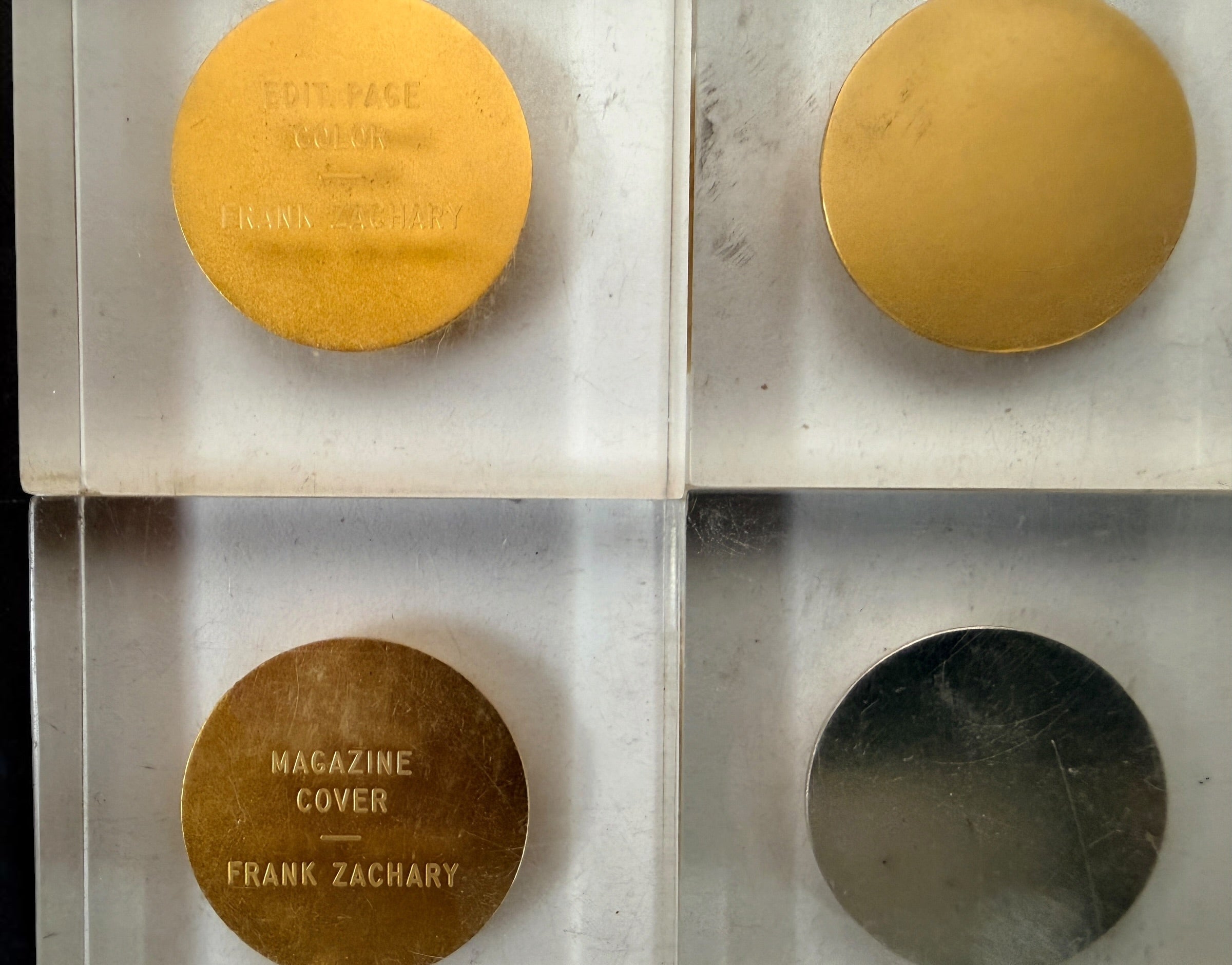 Explore eight vintage graphic arts awards associated with Frank Zachary, including a 1962 Philadelphia Printing Week medallion