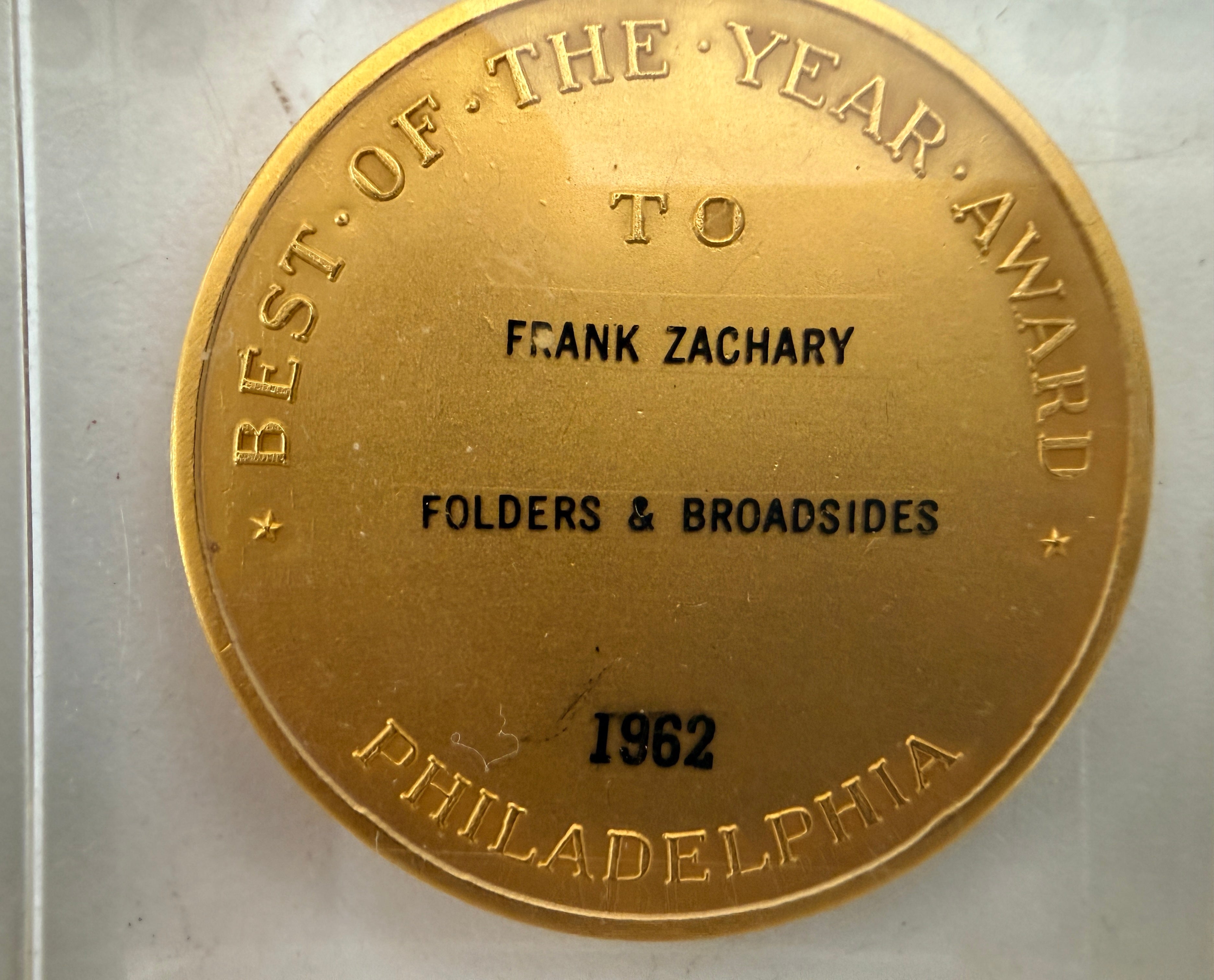 Explore eight vintage graphic arts awards associated with Frank Zachary, including a 1962 Philadelphia Printing Week medallion