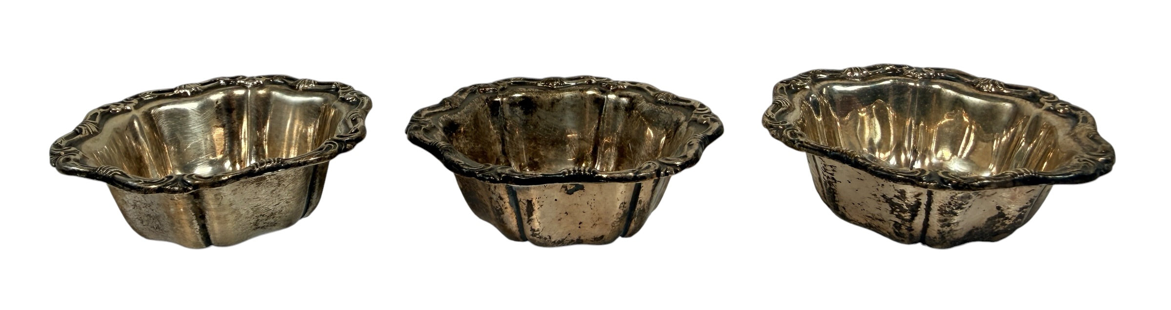 Set of 3 vintage Birks sterling silver bowls with scalloped sides and ornate scroll rims. Beautiful for display, collecting or wrapped sweets.