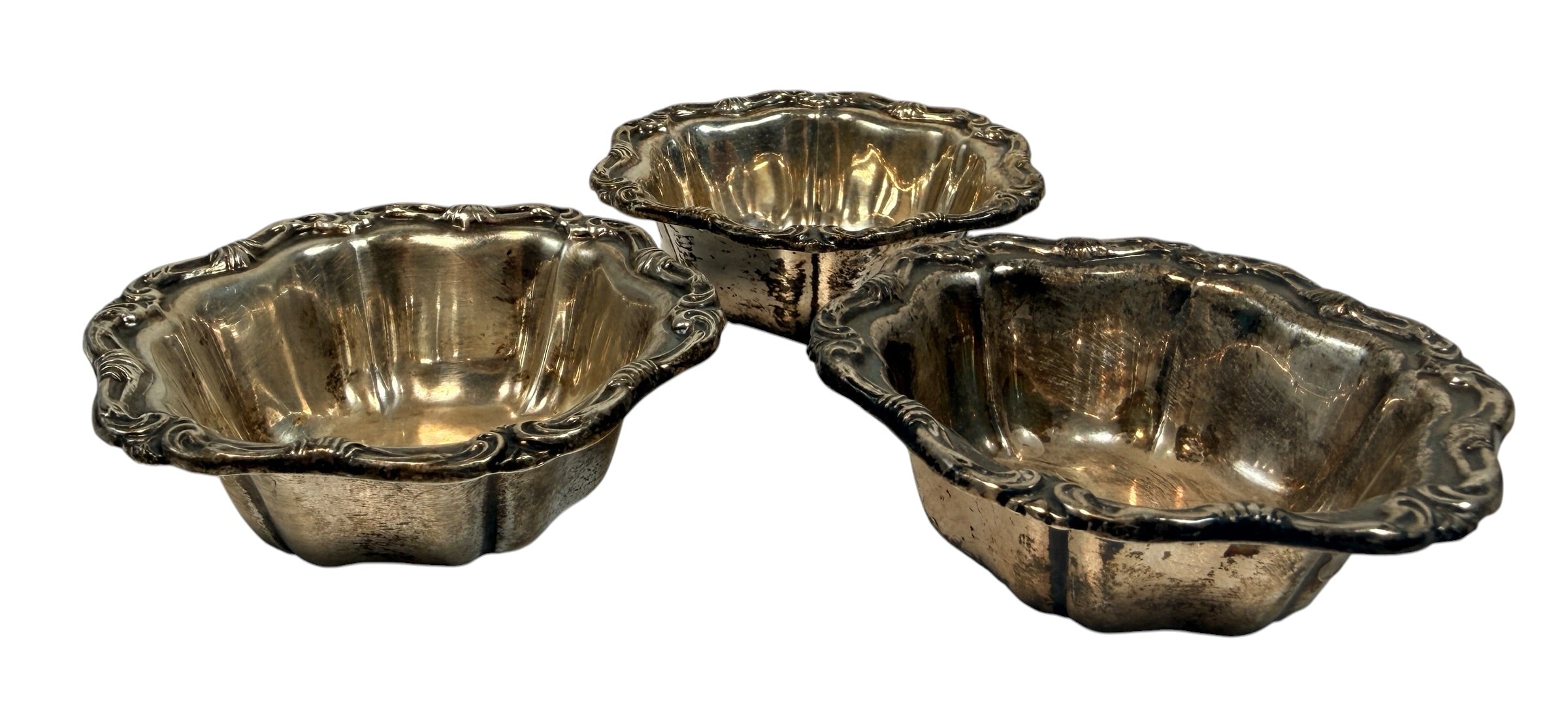Set of 3 vintage Birks sterling silver bowls with scalloped sides and ornate scroll rims. Beautiful for display, collecting or wrapped sweets.