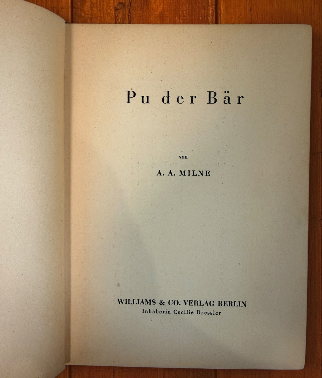 Discover a vintage German edition of Pu der Bär by A. A. Milne, illustrated by E. H. Shepard. Undated hardcover with visible age and wear.