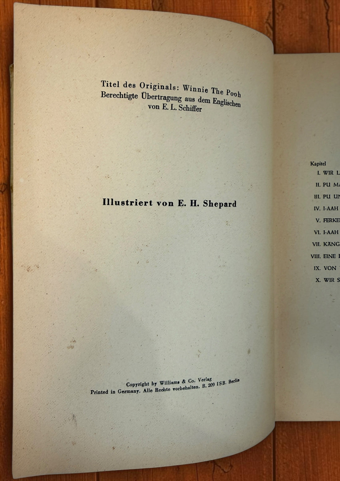 Discover a vintage German edition of Pu der Bär by A. A. Milne, illustrated by E. H. Shepard. Undated hardcover with visible age and wear.