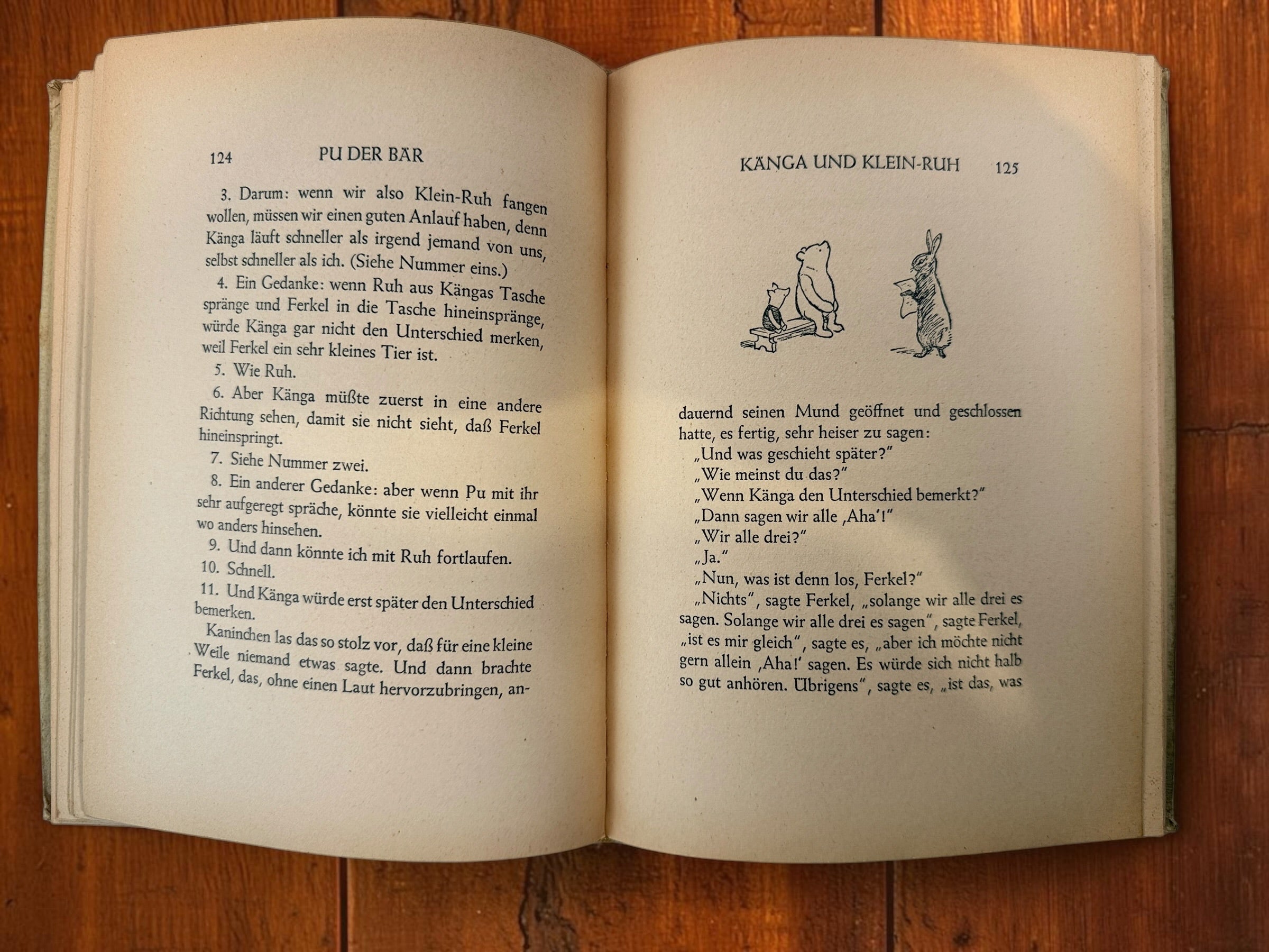 Discover a vintage German edition of Pu der Bär by A. A. Milne, illustrated by E. H. Shepard. Undated hardcover with visible age and wear.