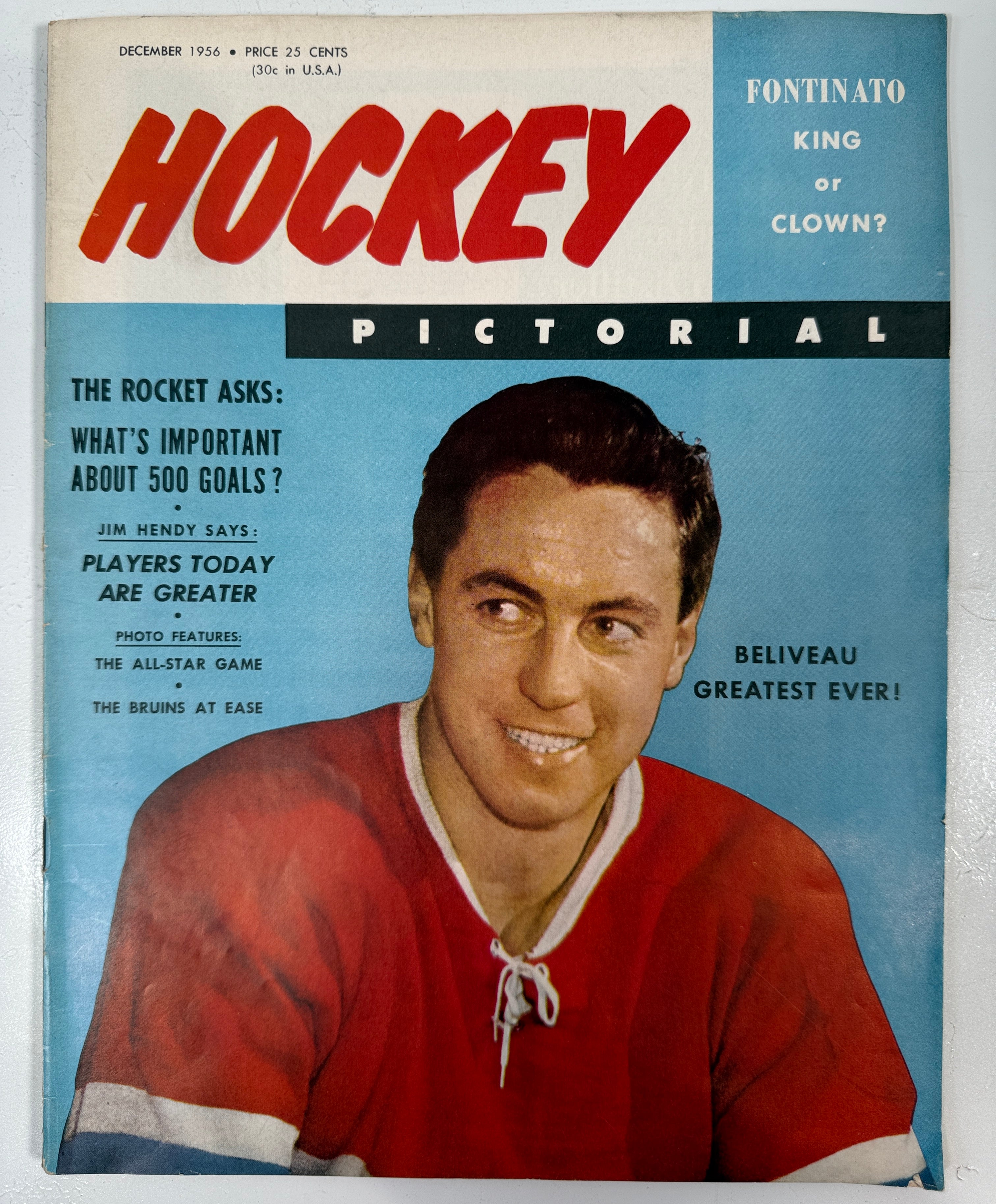 Vintage hockey magazine cover with a player in a red jersey and text about hockey history.