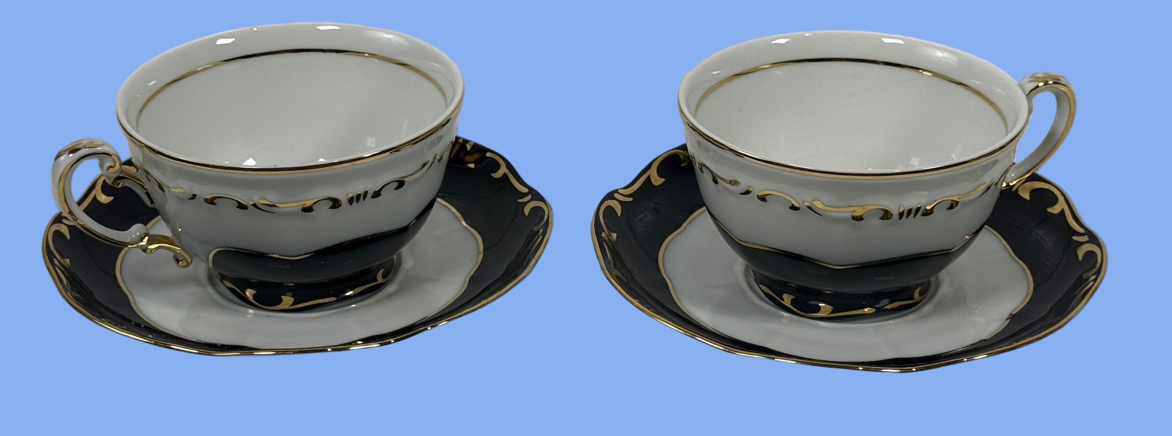 Paire de tasses à thé et soucoupes vintage en porcelaine de Hongrie Zsolnay (2 unités) – Bleu cobalt avec bordure dorée