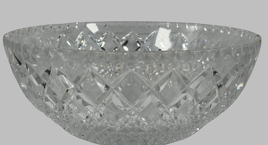 Crystal bowl with cut glass design on a black background