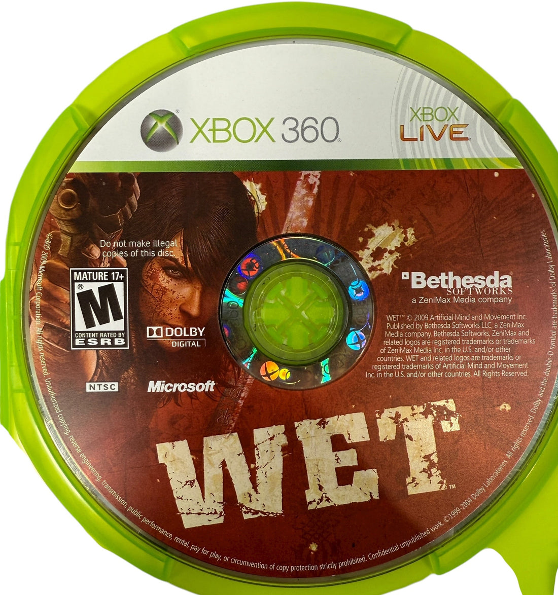 Xbox 360 game disc for 'WET' with green label