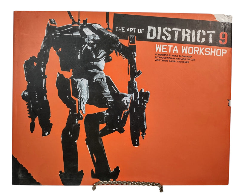 Livre relié de l'atelier Weta sur l'art du district 9