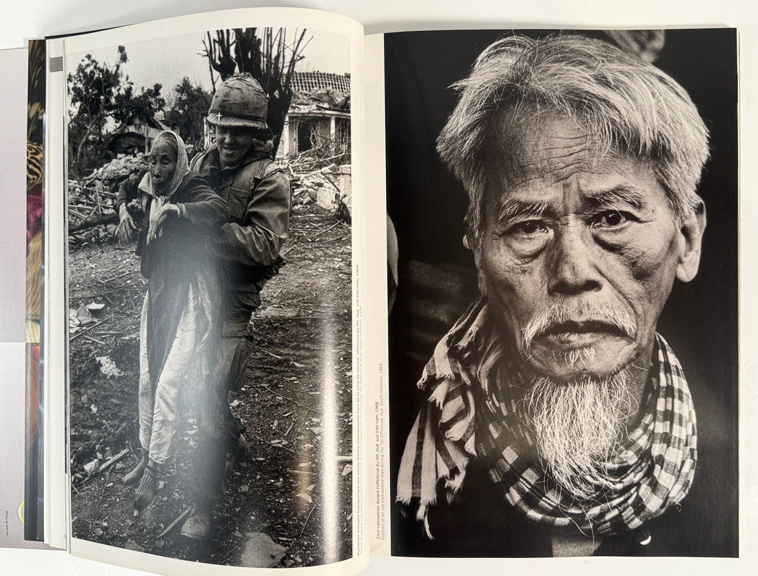 Open book showing black and white photographs of an elderly man in a rural setting.