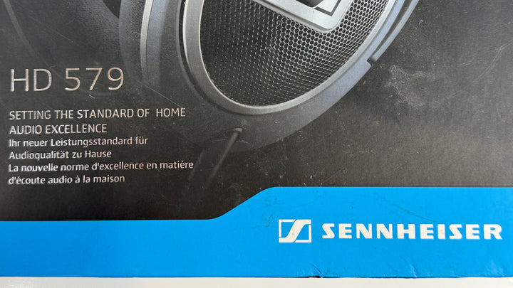 Sennheiser HD 579 speaker packaging with branding and product details.