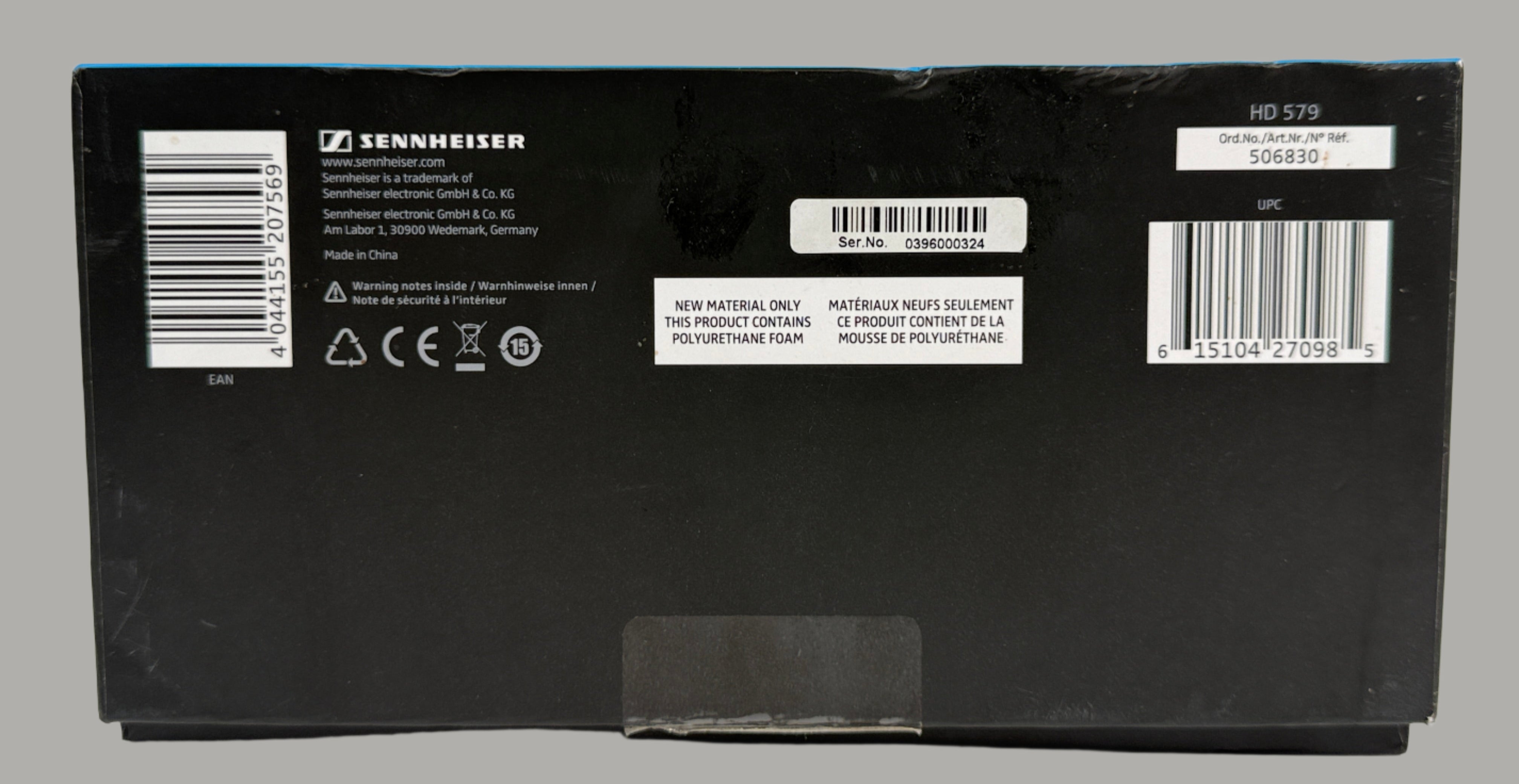 Sennheiser product packaging with labels and barcodes on a white background