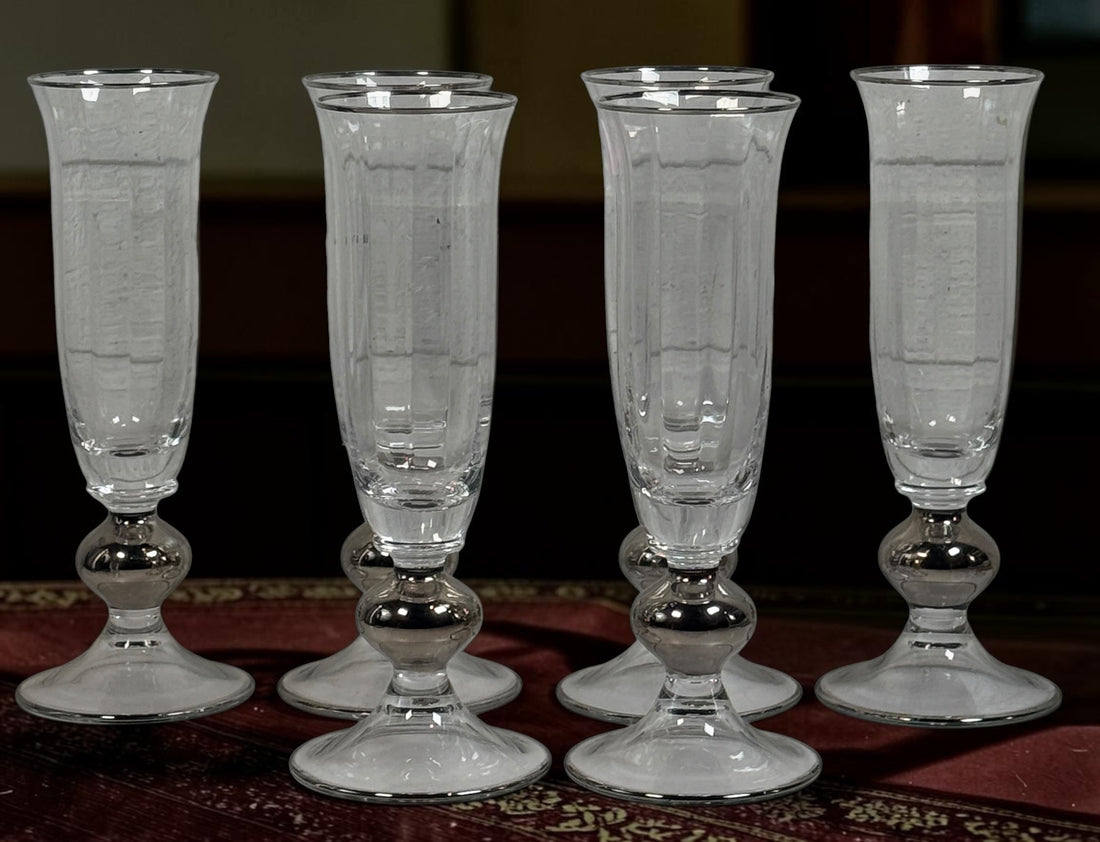Champagne flutes with silver-tone decoration — product and condition detail