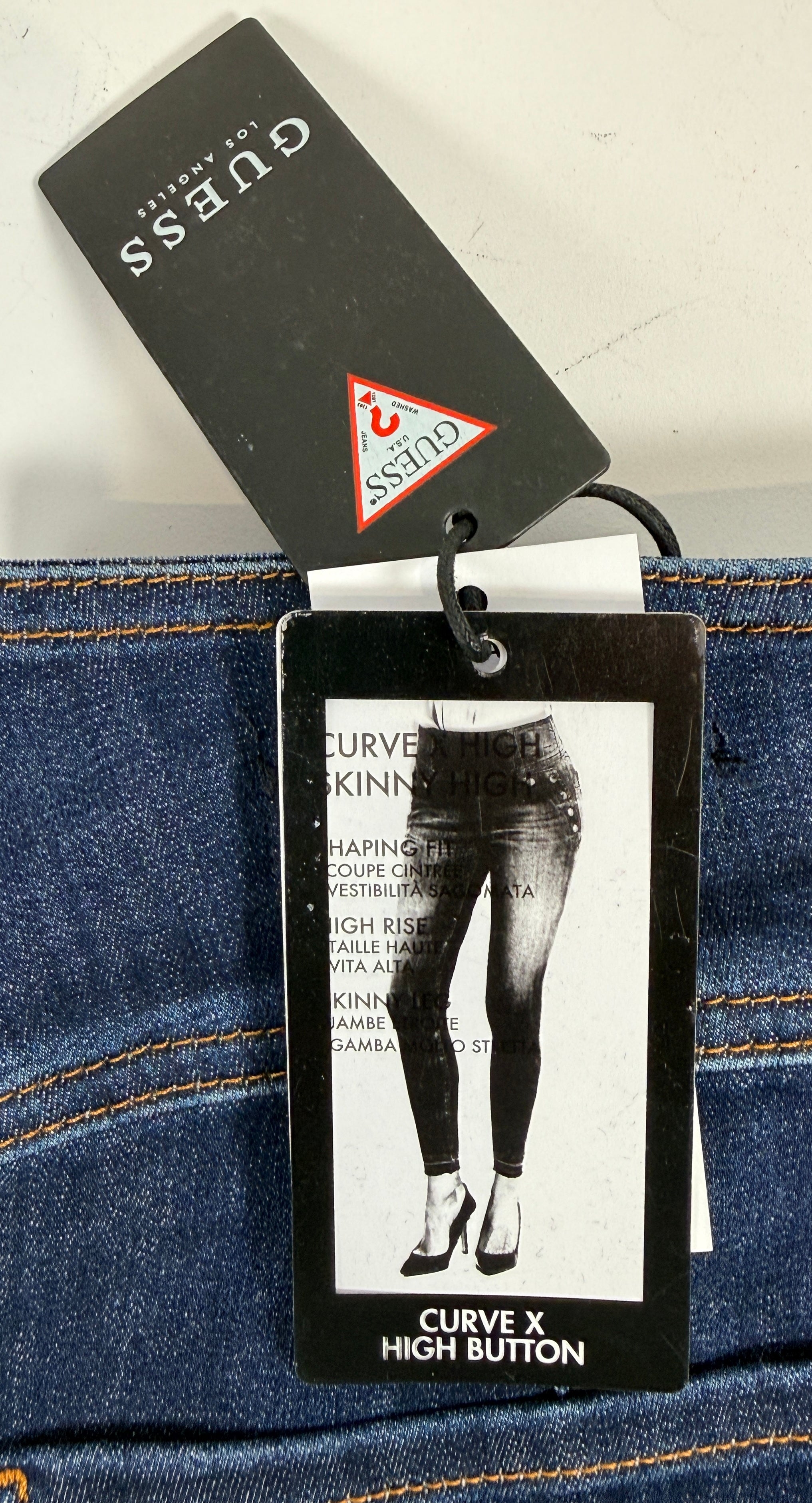 GUESS Curve X High Button skinny jeans in Ultimate Dark wash. High-rise stretch denim with gold-tone button accents. New with tags, size 29x30.