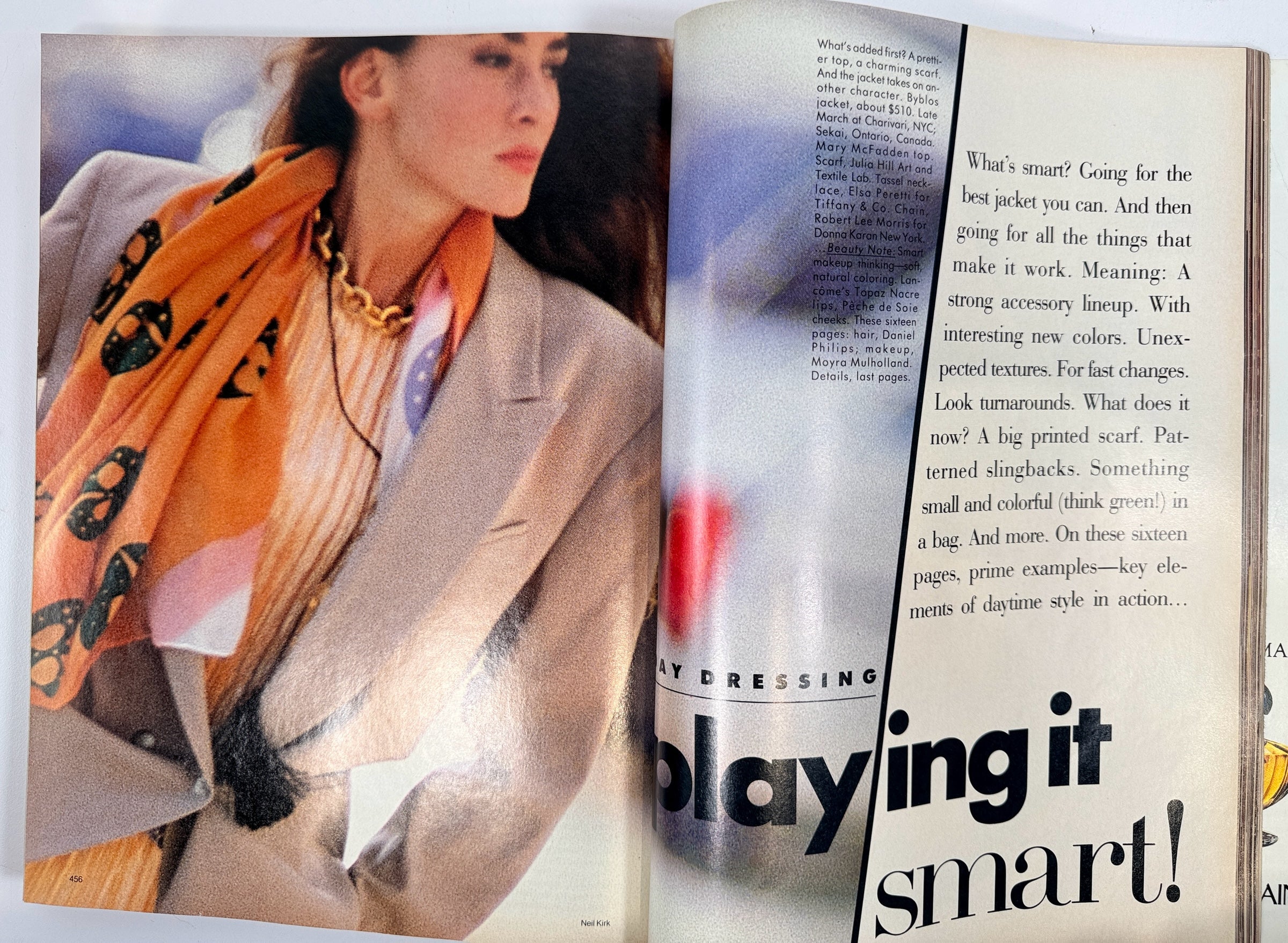 Éco-Dépôt Montréal vintage 1988 Vogue magazine editorial spread featuring a model in a beige blazer and orange scarf.