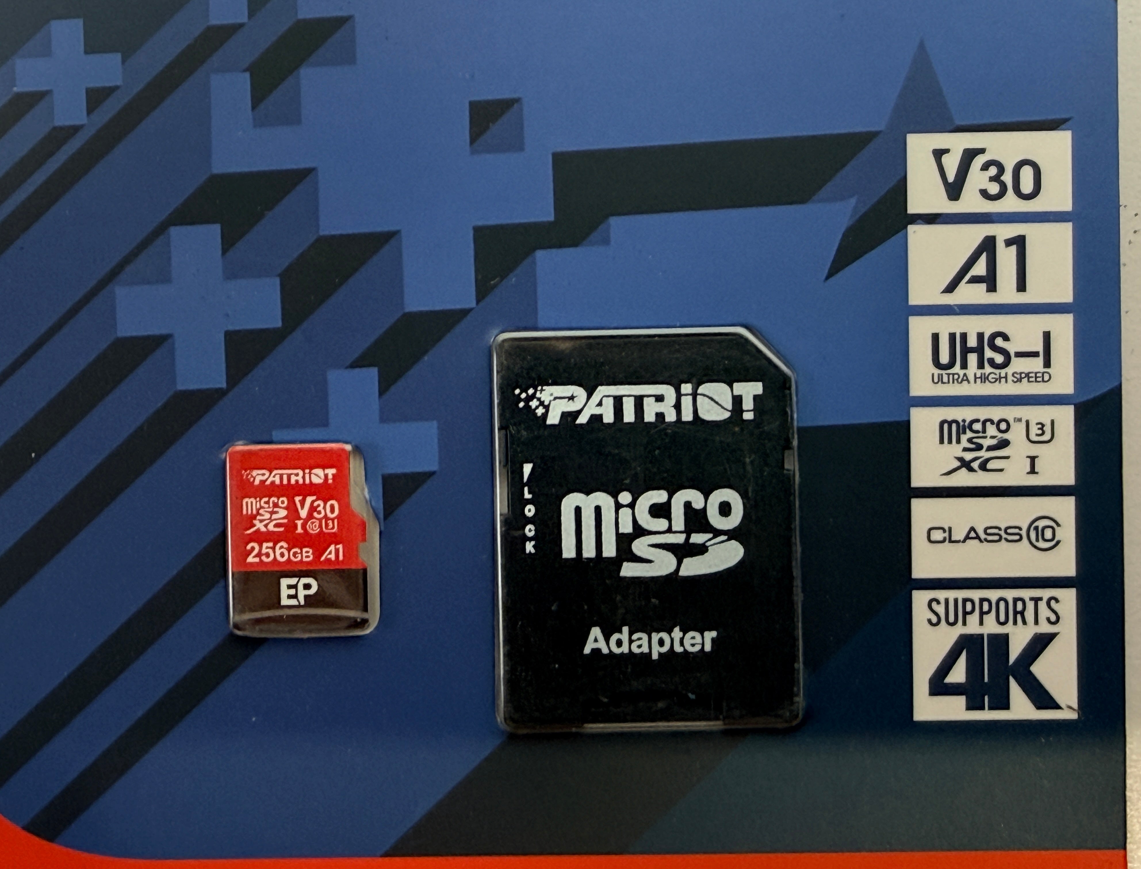 Patriot microSD card with adapter on a blue background