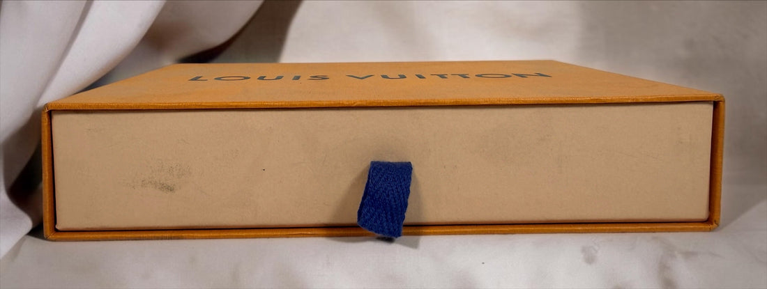 Front of orange Louis Vuitton branded drawer box