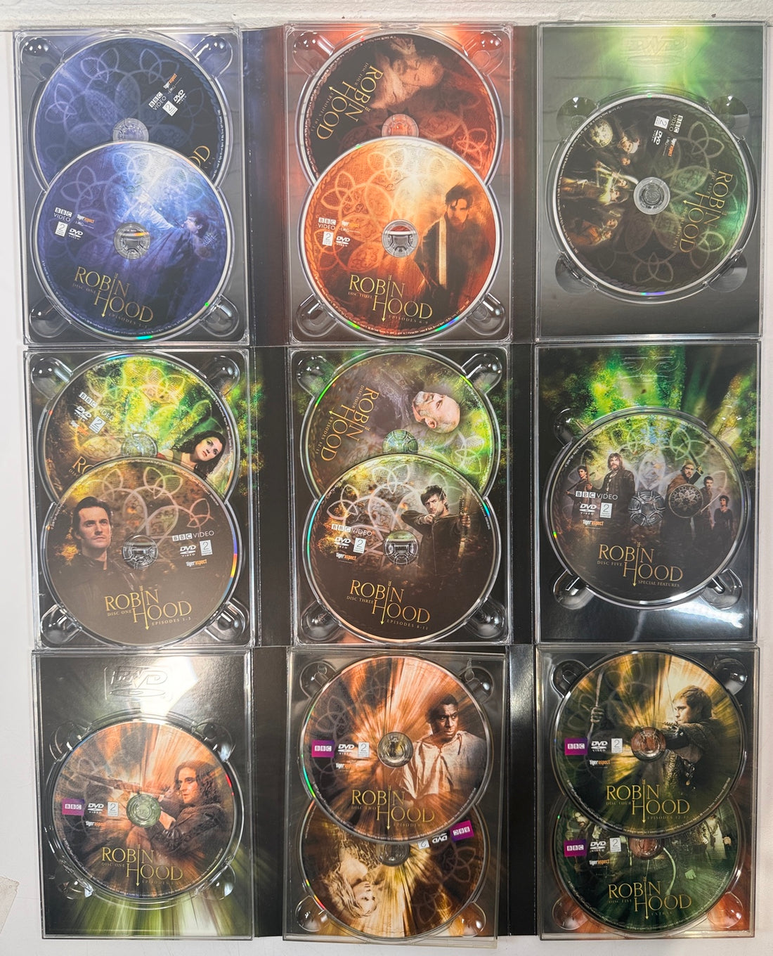 All 15 Robin Hood DVDs in their open cases