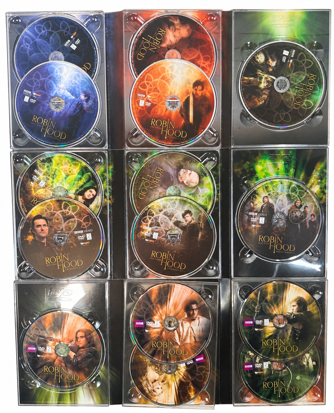 All 15 Robin Hood DVDs in their open cases — white background
