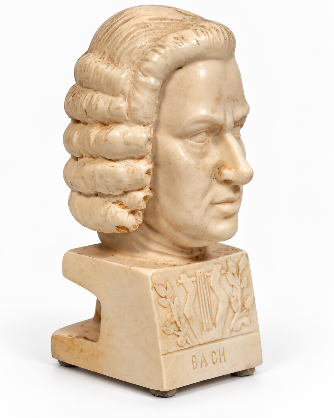 Three-quarter view of Bach bust on white background