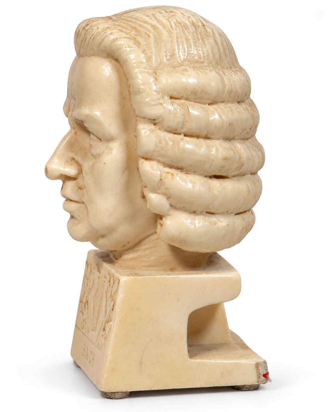 Side view of Bach bust on white background