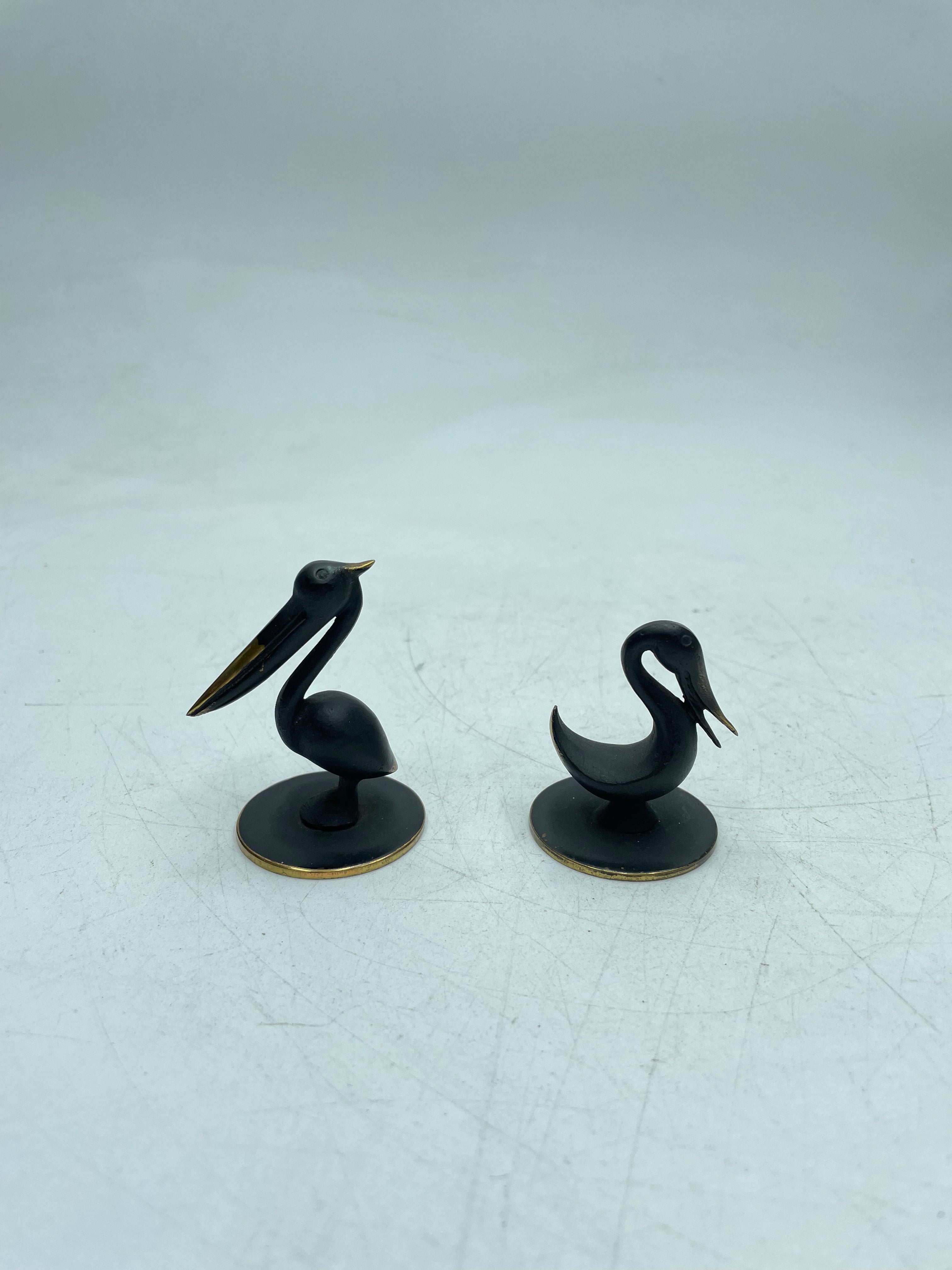 Two Bronze Pelican Figurines