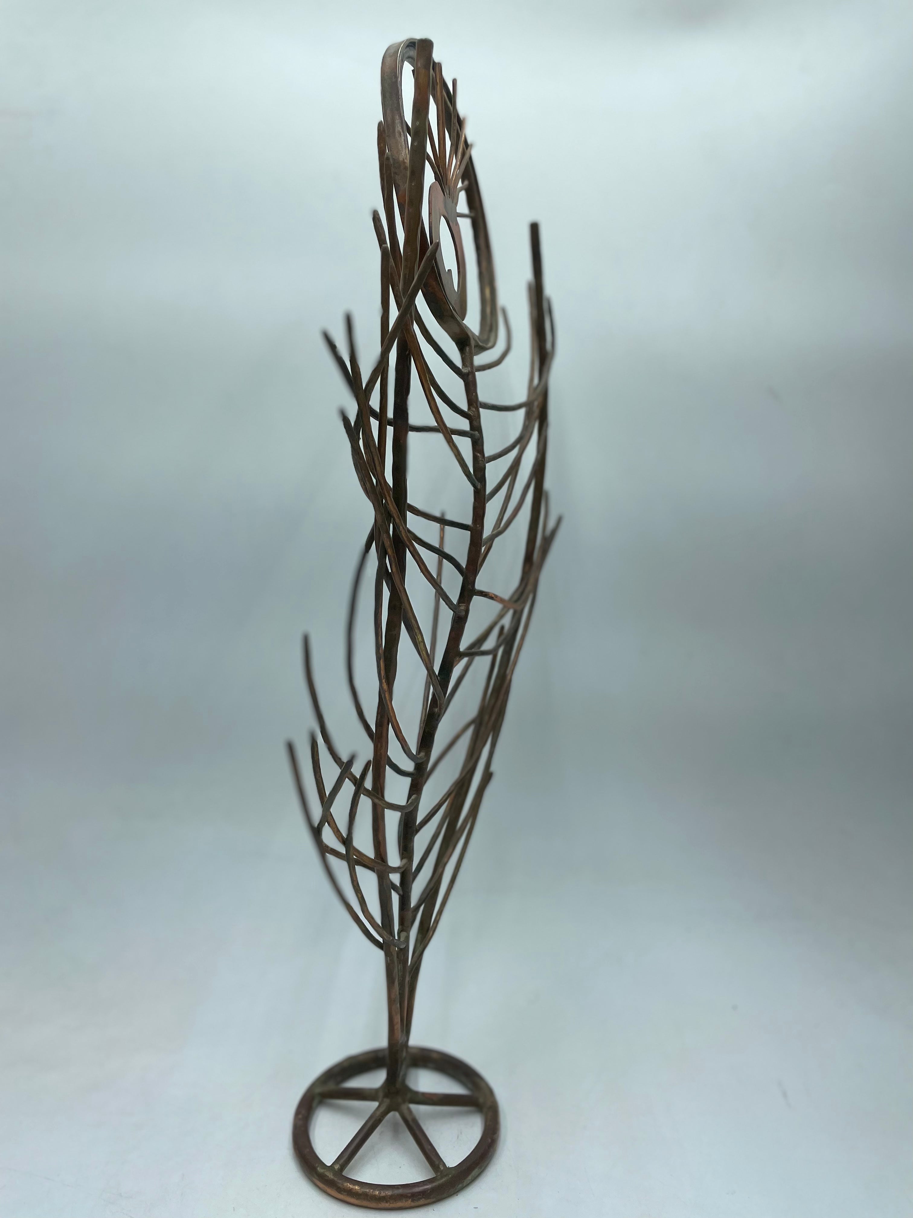 Sculpture en plumes de paon par Menachem Gosher